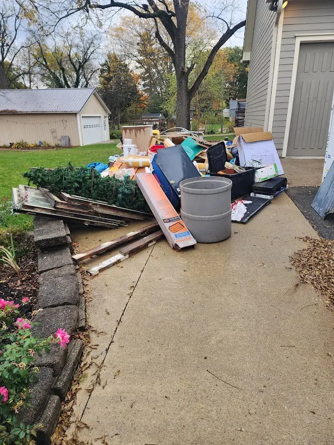 Dumpster being loaded with debris for Residential Dumpster Rental in Buellton